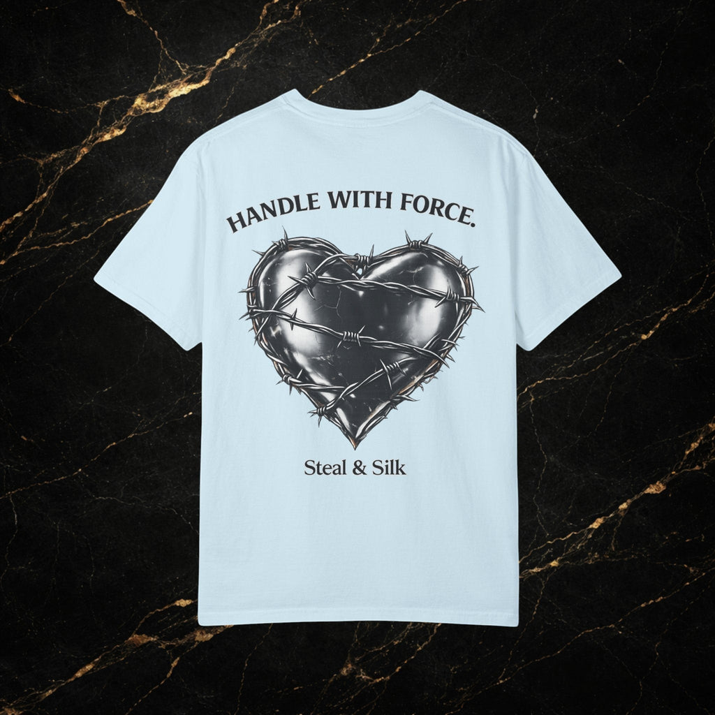 Steal & Silk light blue cotton t-shirt with a black barbed wire heart graphic and "Handle With Force" text.
