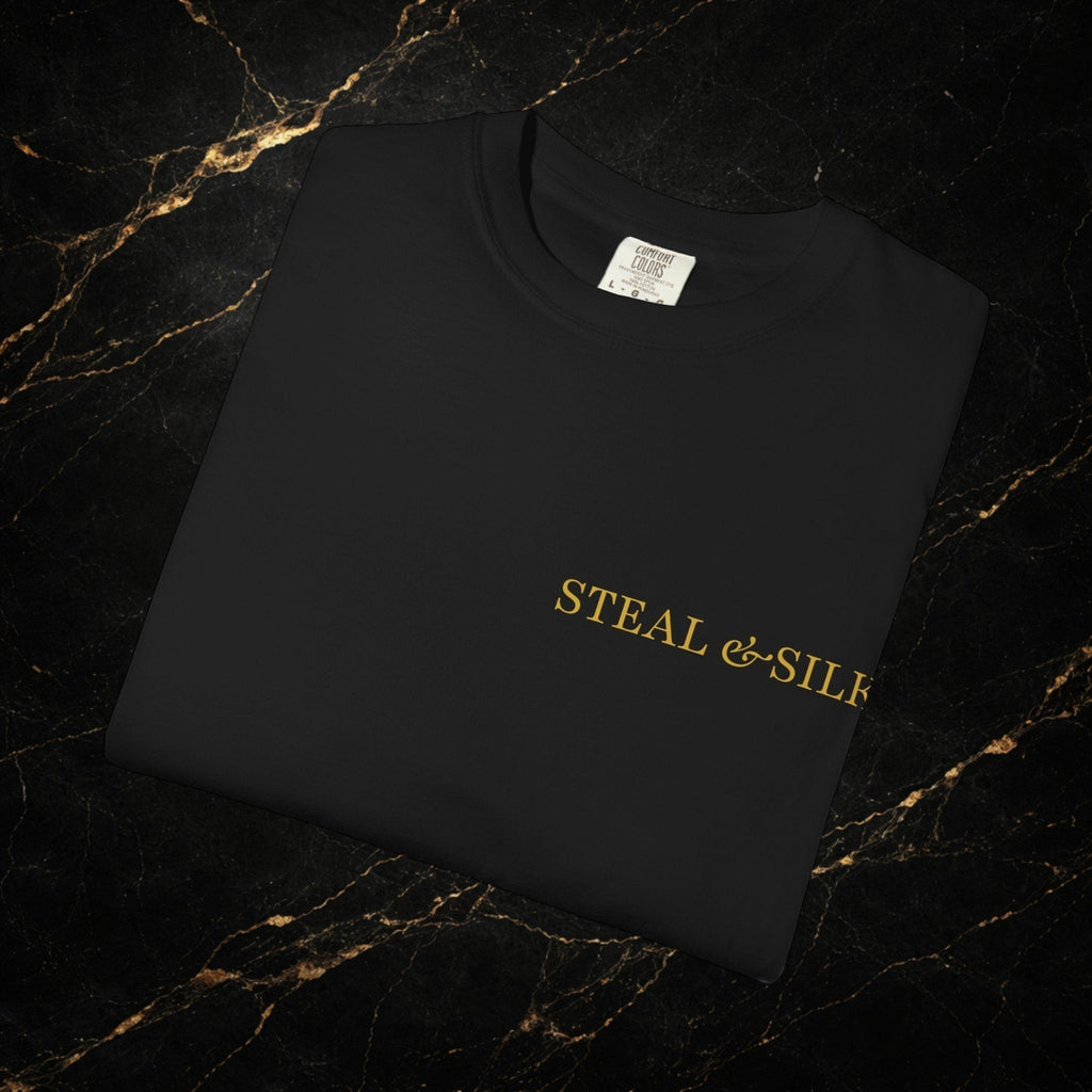 Steal & Silk black cotton t-shirt with gold "Handle With Force" heart graphic on chest.