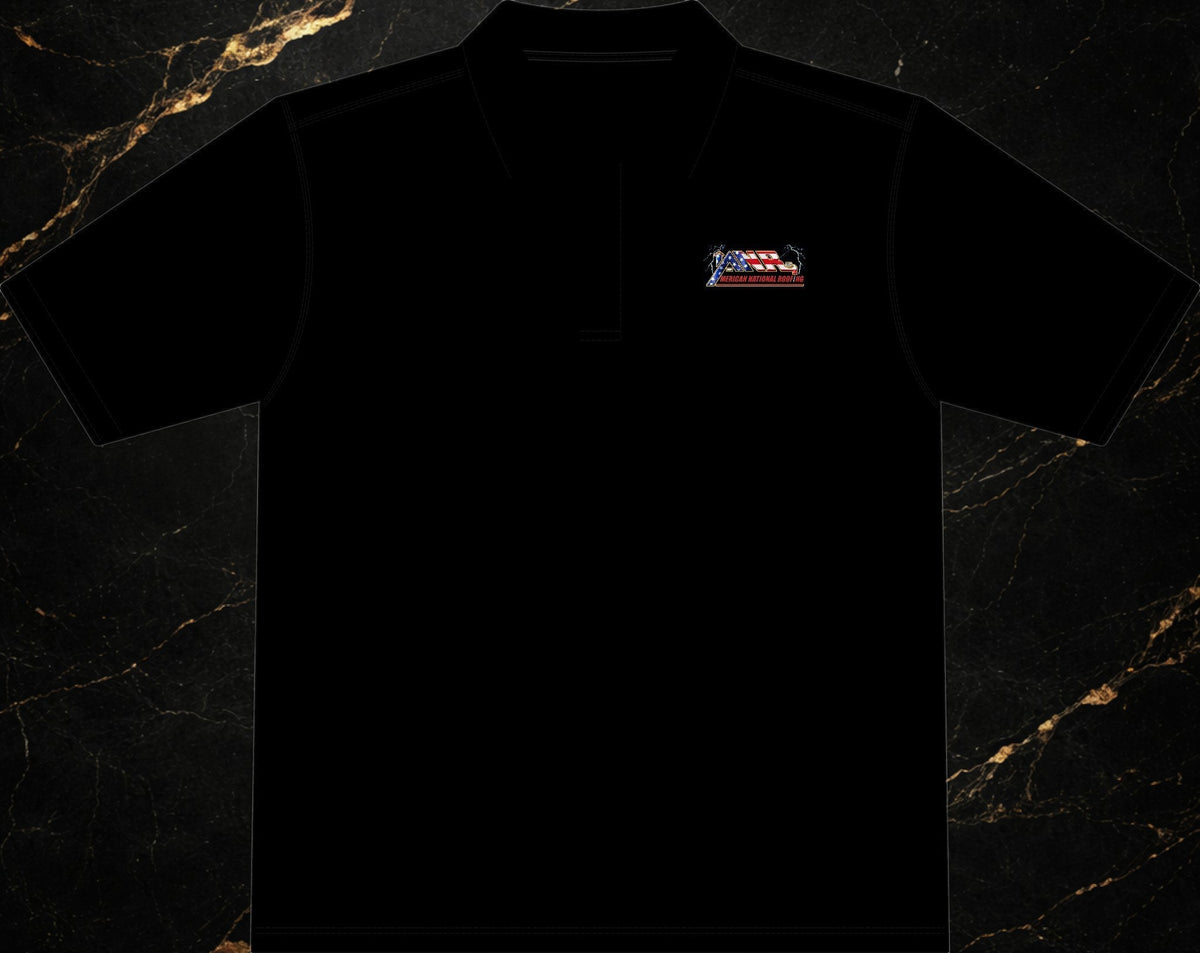 Steal & Silk black moisture-wicking work polo with embroidered American flag logo on the chest.