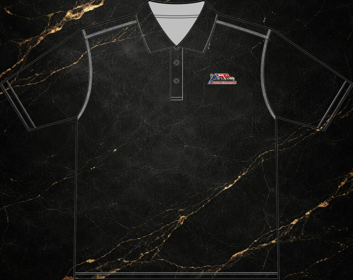 Steal & Silk black workwear polo featuring an embroidered American flag logo on the chest and reinforced stitching.
