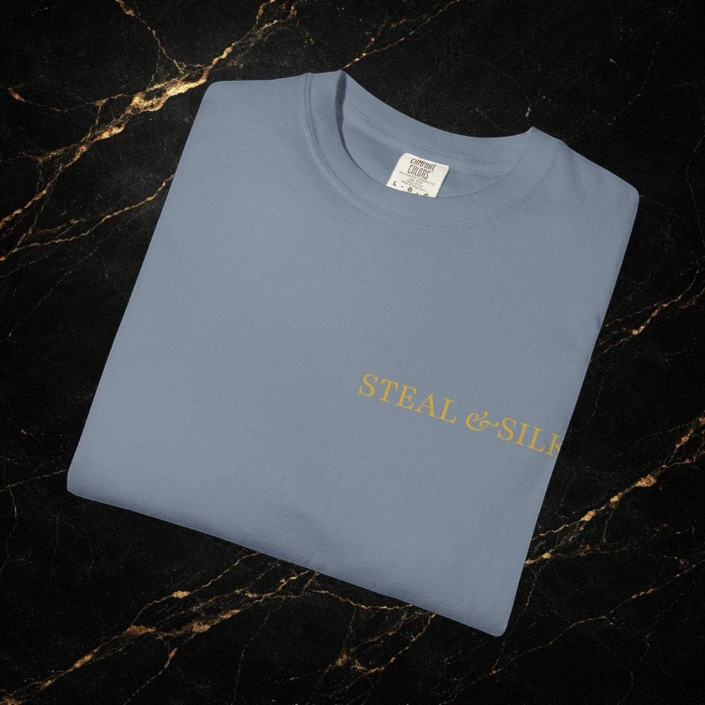 Steal & Silk light blue cotton t-shirt with gold "Handle With Force" heart graphic on front.
