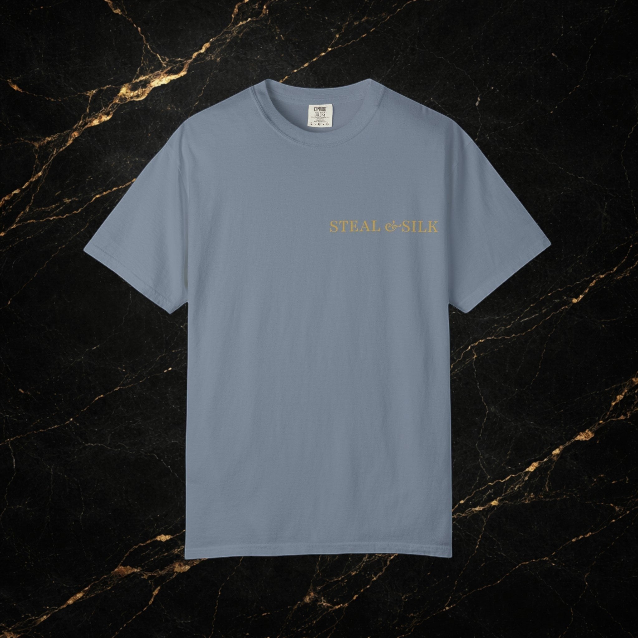 Steal & Silk blue cotton t-shirt with "Handle With Force" heart graphic on chest.