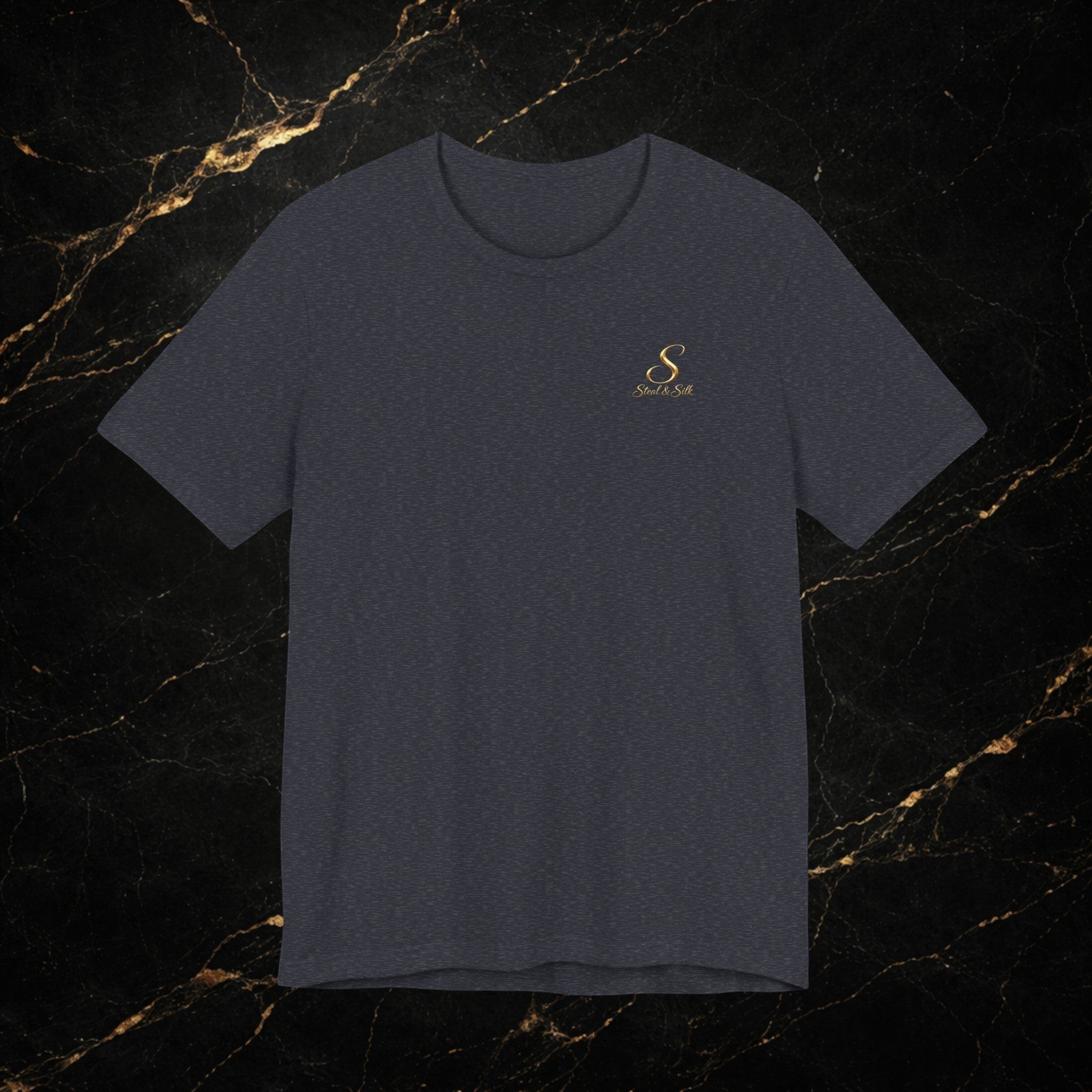 Steal & Silk dark grey 100% cotton t-shirt with a small gold S logo on the chest.