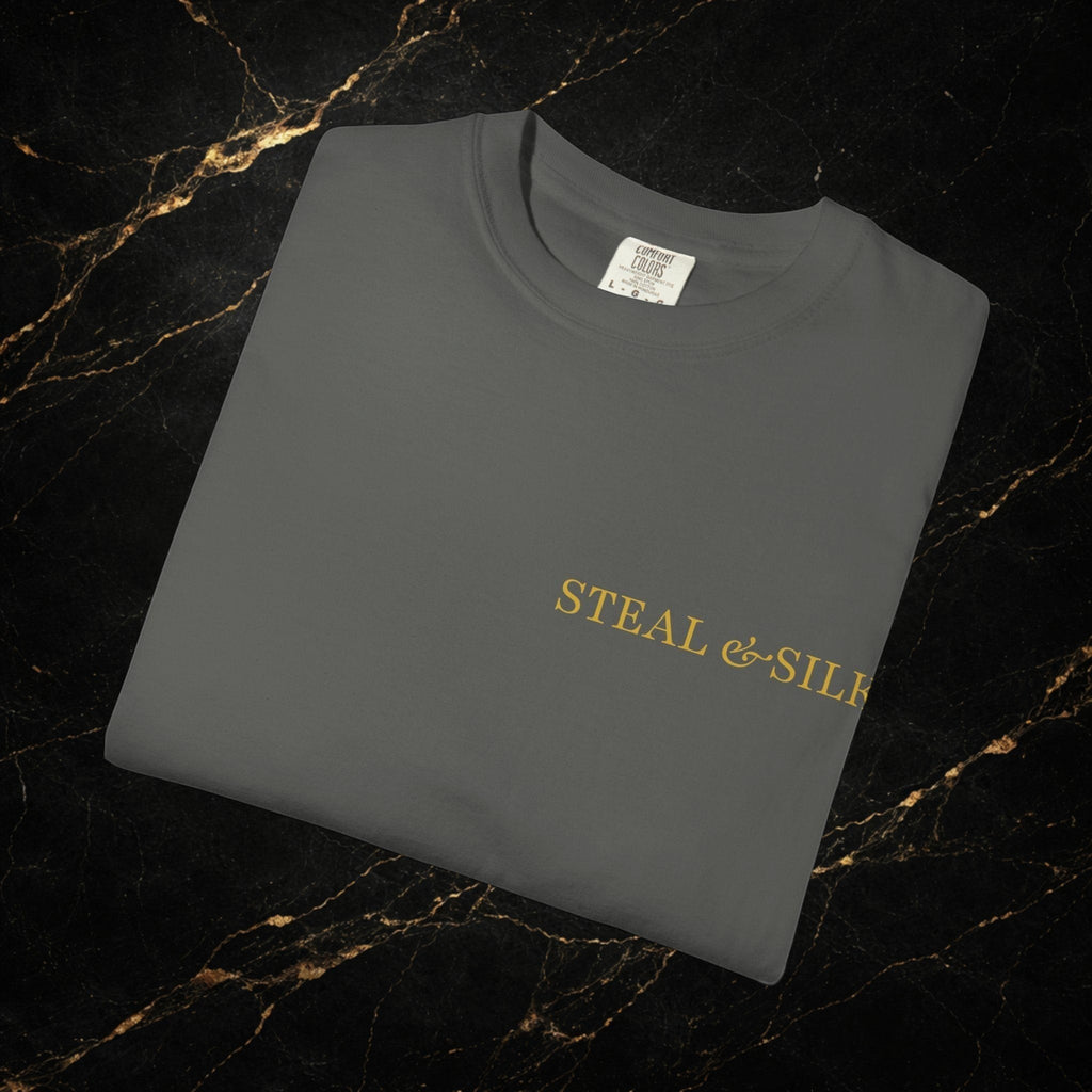 Steal & Silk charcoal grey cotton t-shirt with gold "Handle With Force" heart graphic on the chest.