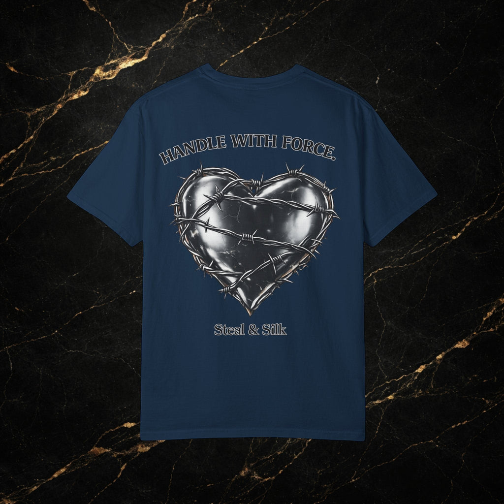 Steal & Silk navy blue cotton t-shirt with a metallic heart graphic wrapped in barbed wire and "Handle With Force" text.