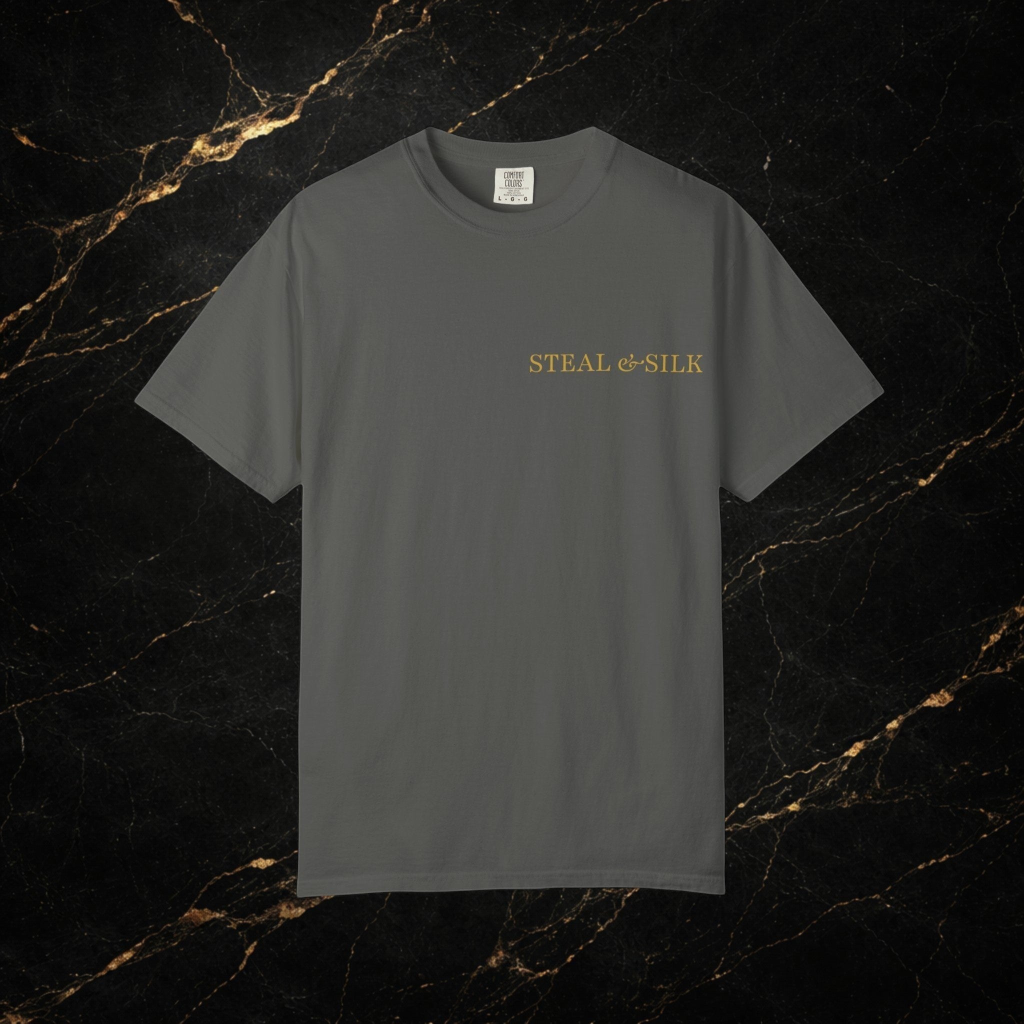 Steal & Silk dark grey cotton t-shirt with gold 'Handle With Force' heart graphic on chest.