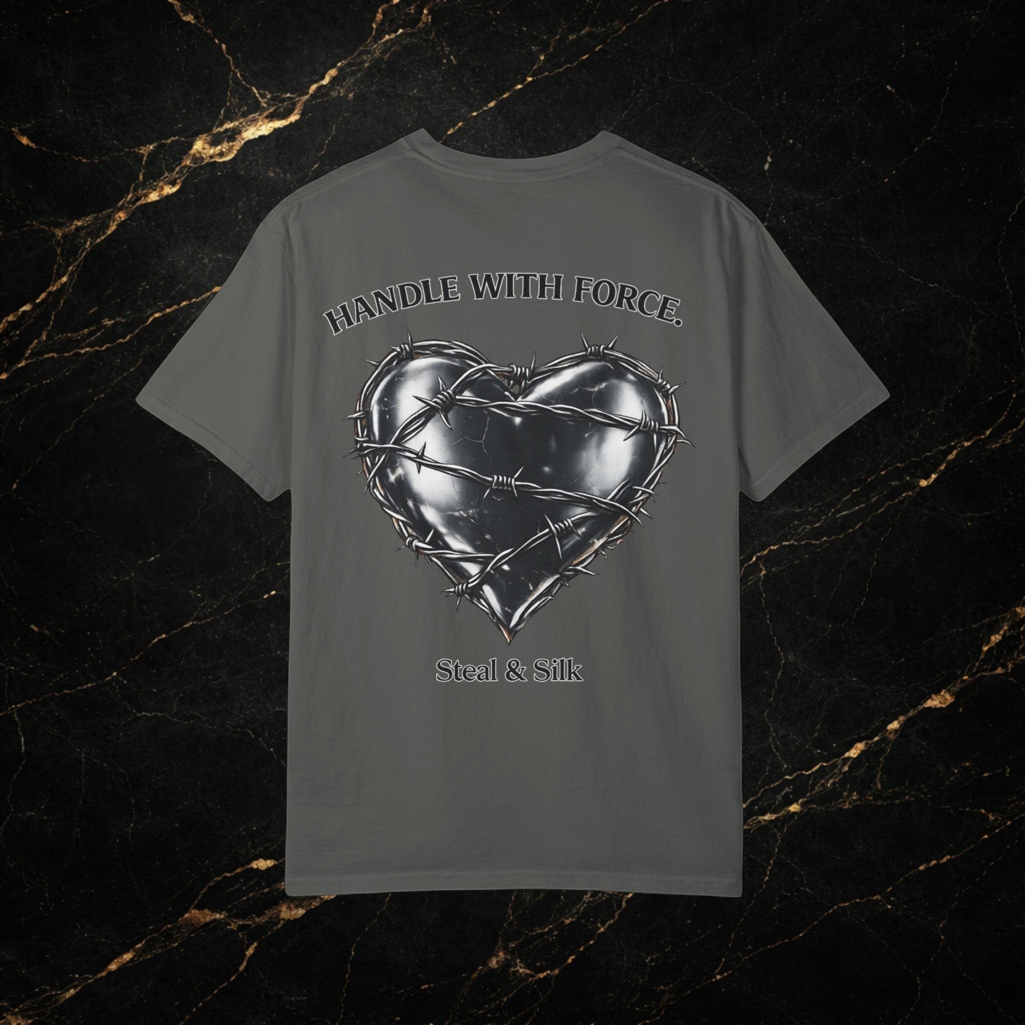 Steal & Silk grey cotton t-shirt with barbed wire heart graphic and "Handle With Force" text.