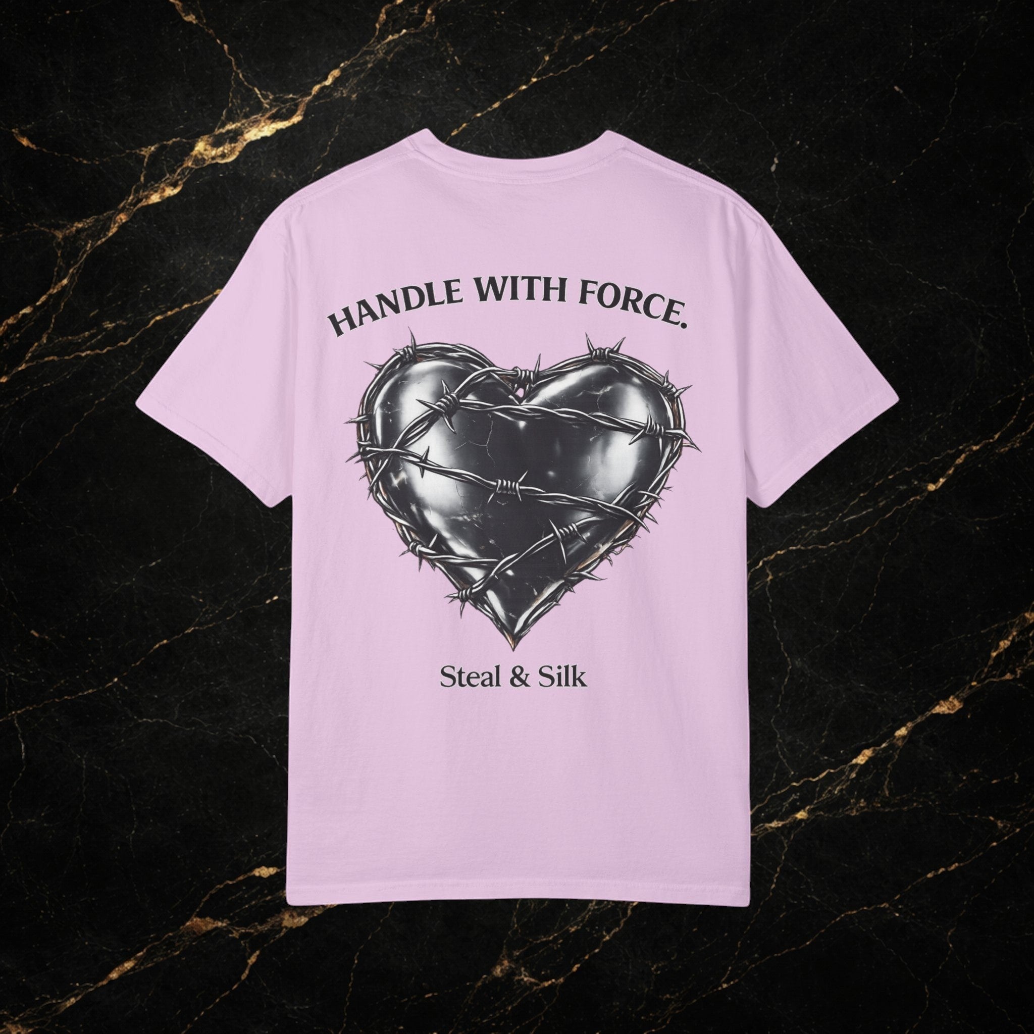 Steal & Silk pink cotton t-shirt with barbed wire heart graphic and "Handle With Force" text.