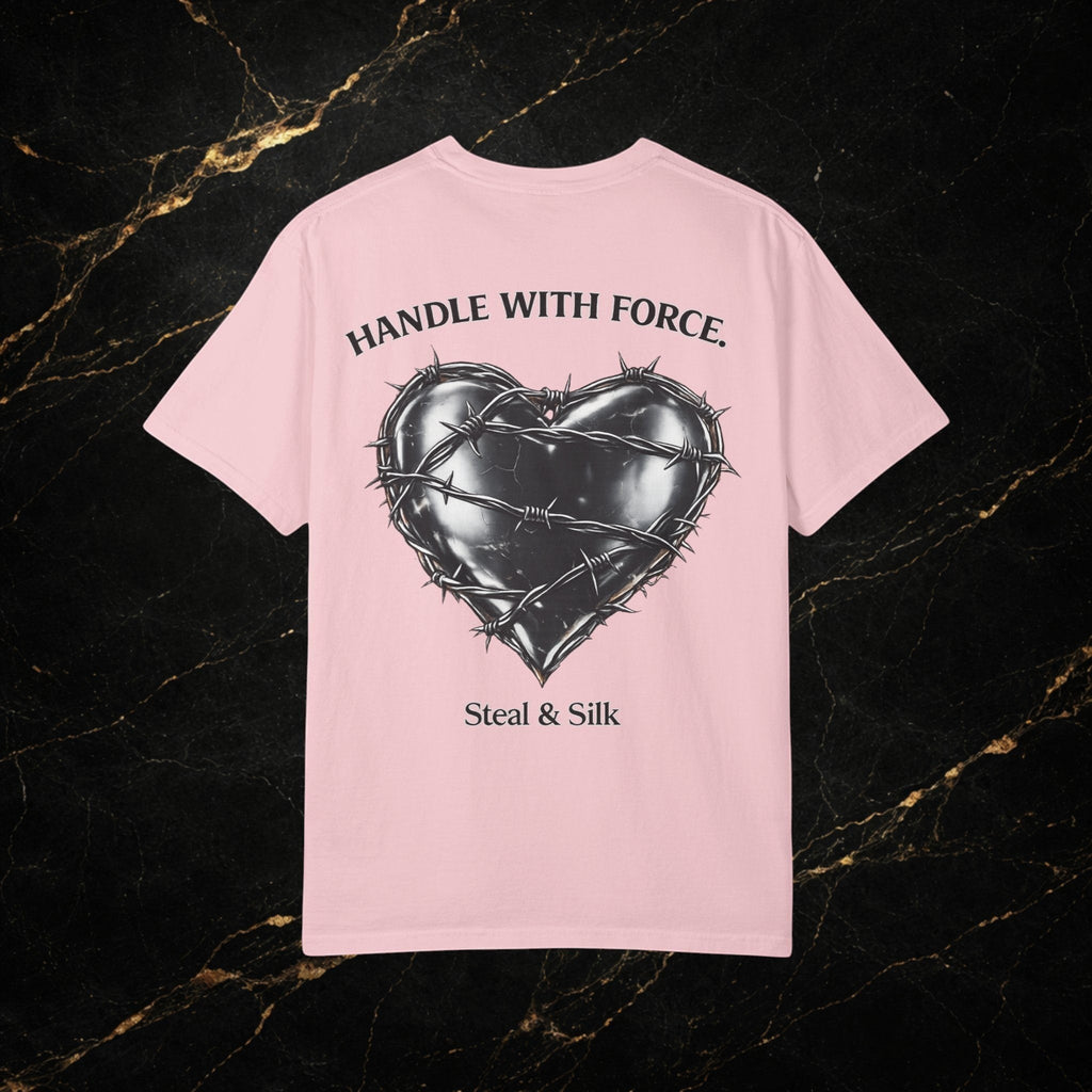 Steal & Silk pink cotton t-shirt with a black barbed wire heart graphic and "Handle With Force" text.