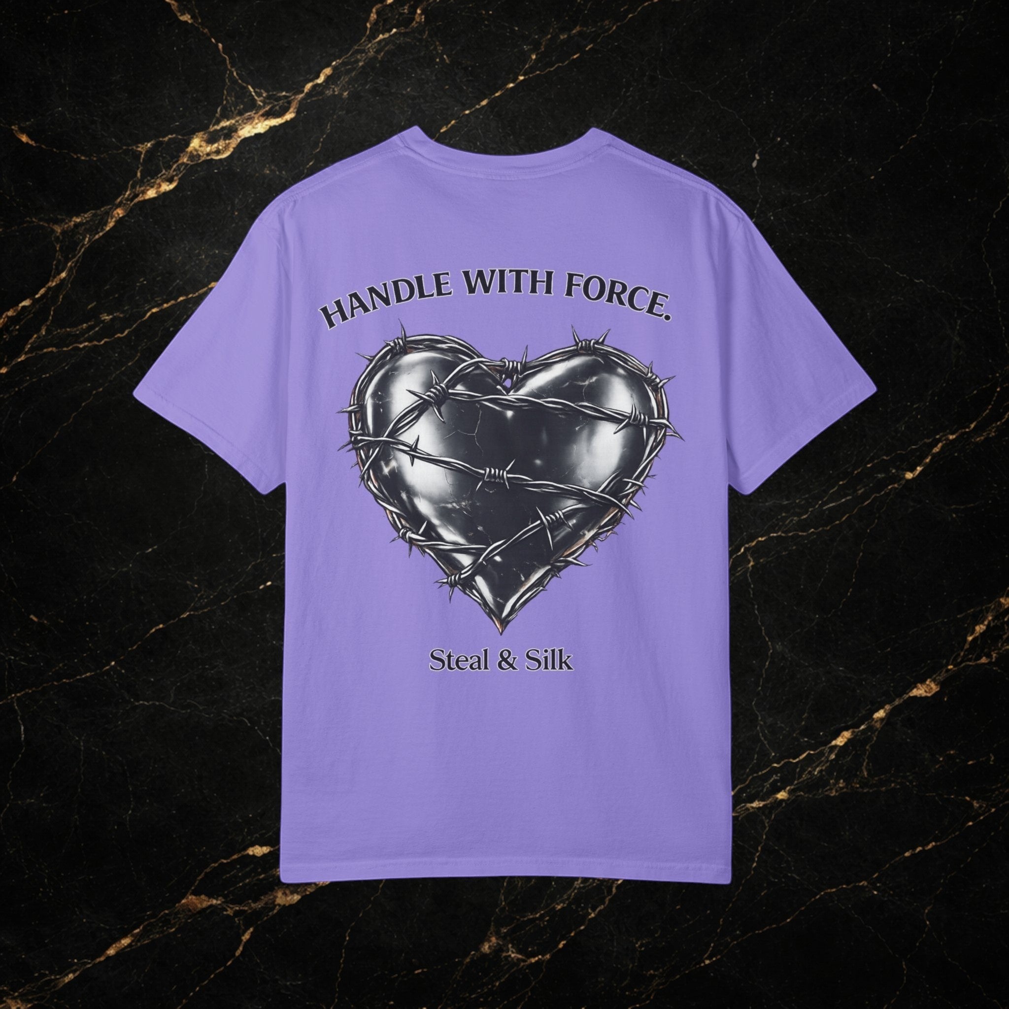 Steal & Silk purple cotton t-shirt with barbed wire heart graphic and "Handle With Force" text.