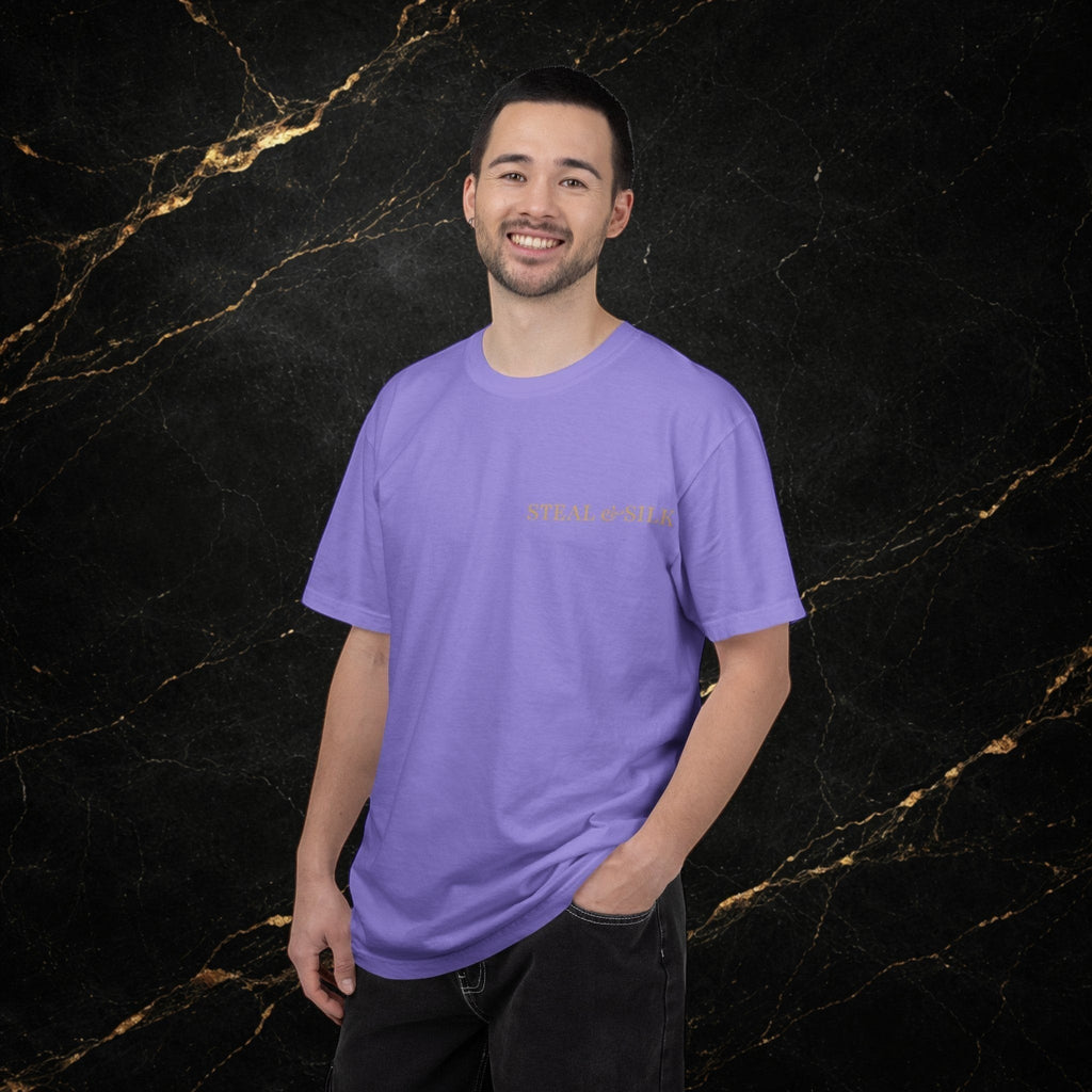 Steal & Silk Handle With Force Heart Graphic T-Shirt in lavender cotton with a subtle gold logo on the chest.