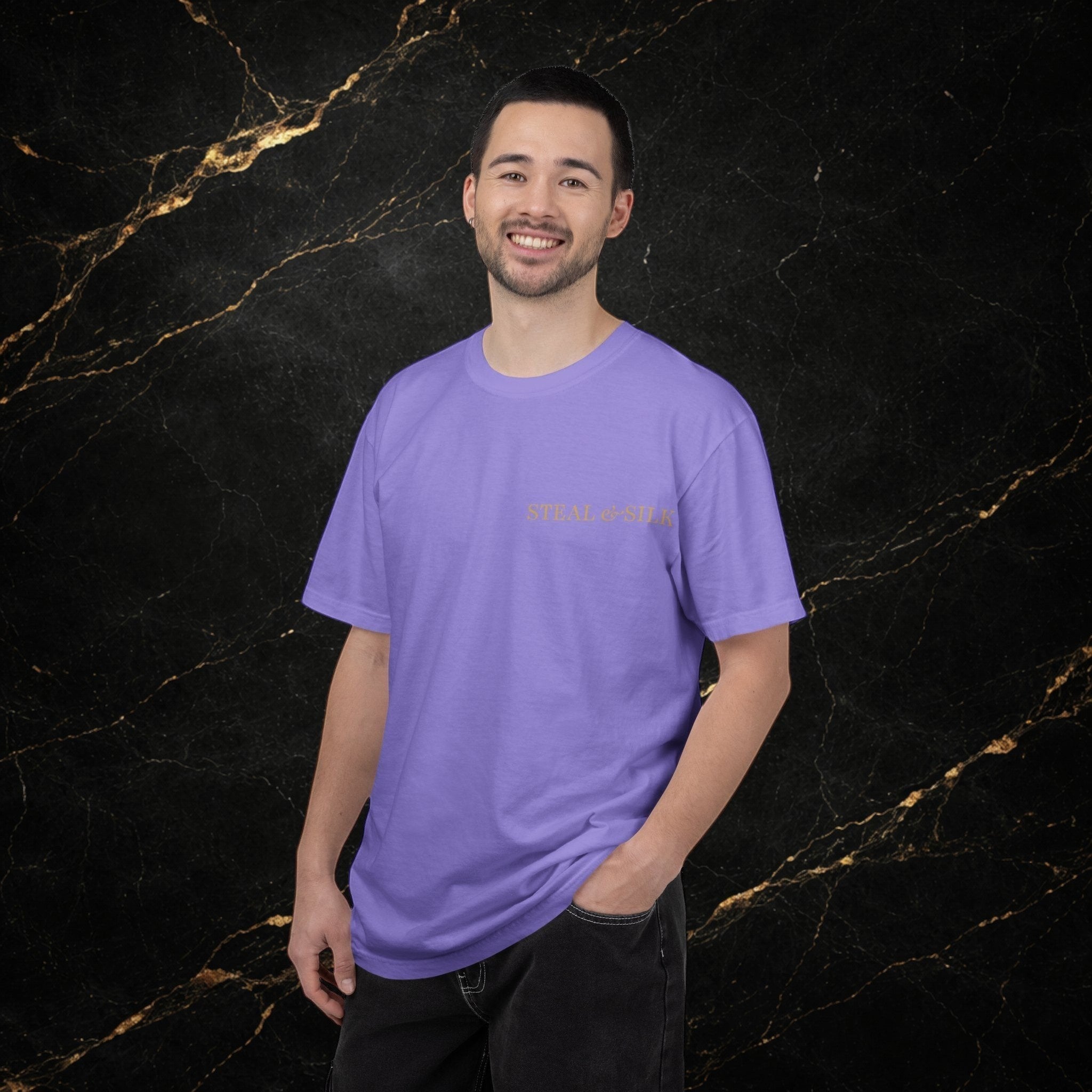 Steal & Silk Handle With Force Heart Graphic T-Shirt in lavender cotton with a subtle gold logo on the chest.