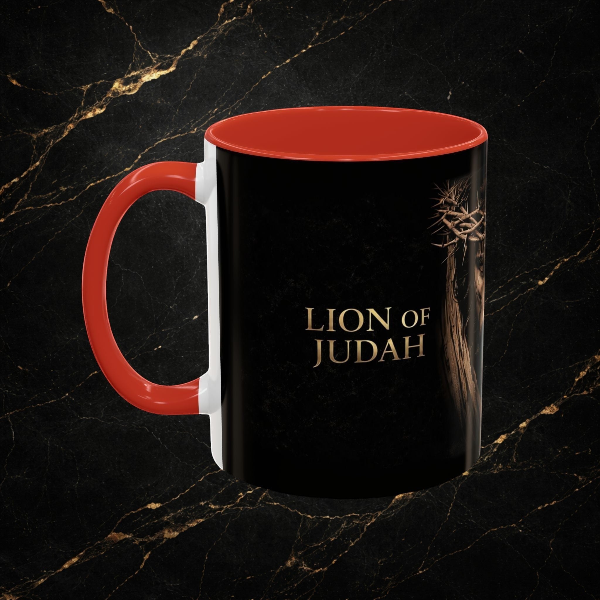 Steal & Silk black ceramic mug with red interior and handle, featuring "Lion of Judah" text and crown of thorns graphic.