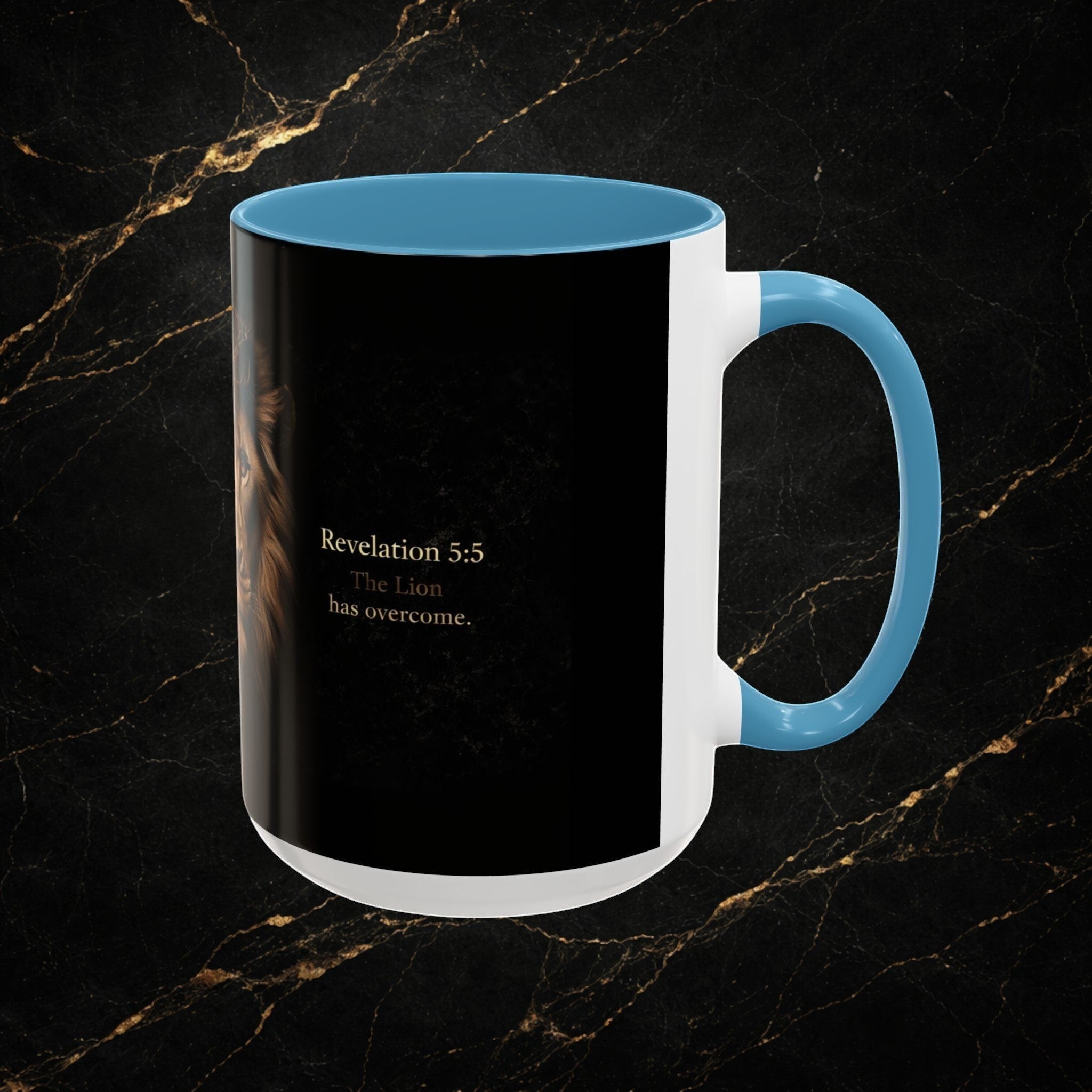 Steal & Silk white ceramic mug with blue handle and interior, featuring a black background with a lion's face and "Revelation 5:5 The Lion has overcome."