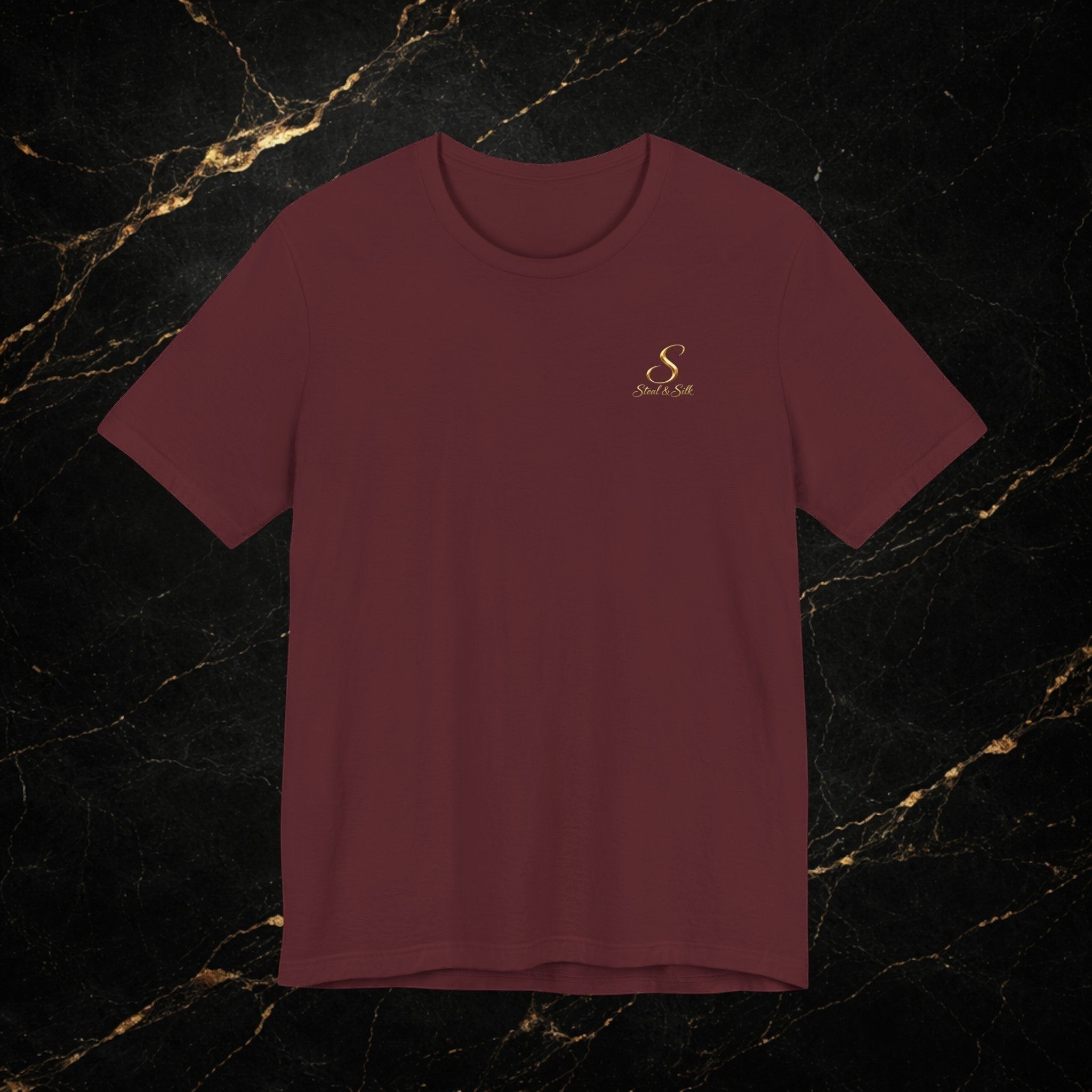 Steal & Silk maroon 100% cotton t-shirt with a vintage badge graphic on the chest and back.