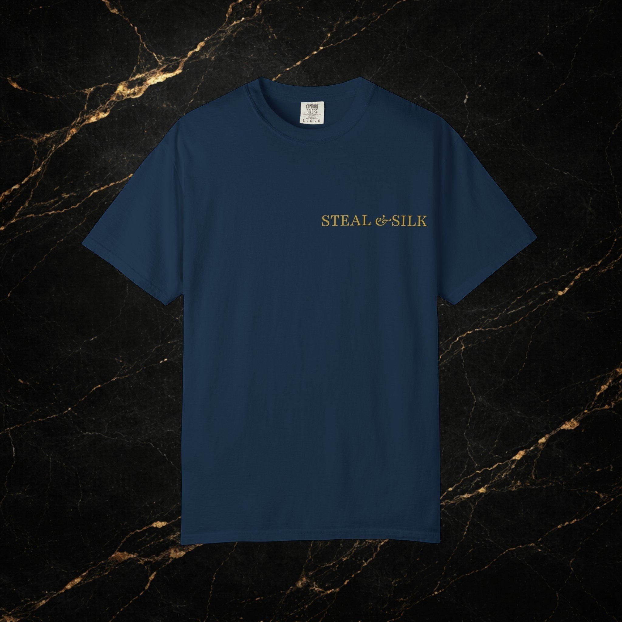 Steal & Silk navy blue cotton t-shirt with gold "Handle With Force" heart graphic on chest.