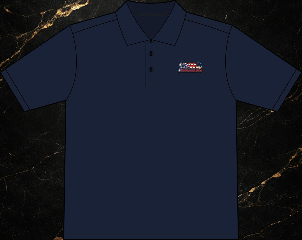 Steal & Silk navy blue moisture-wicking work polo with an embroidered American flag logo on the chest.