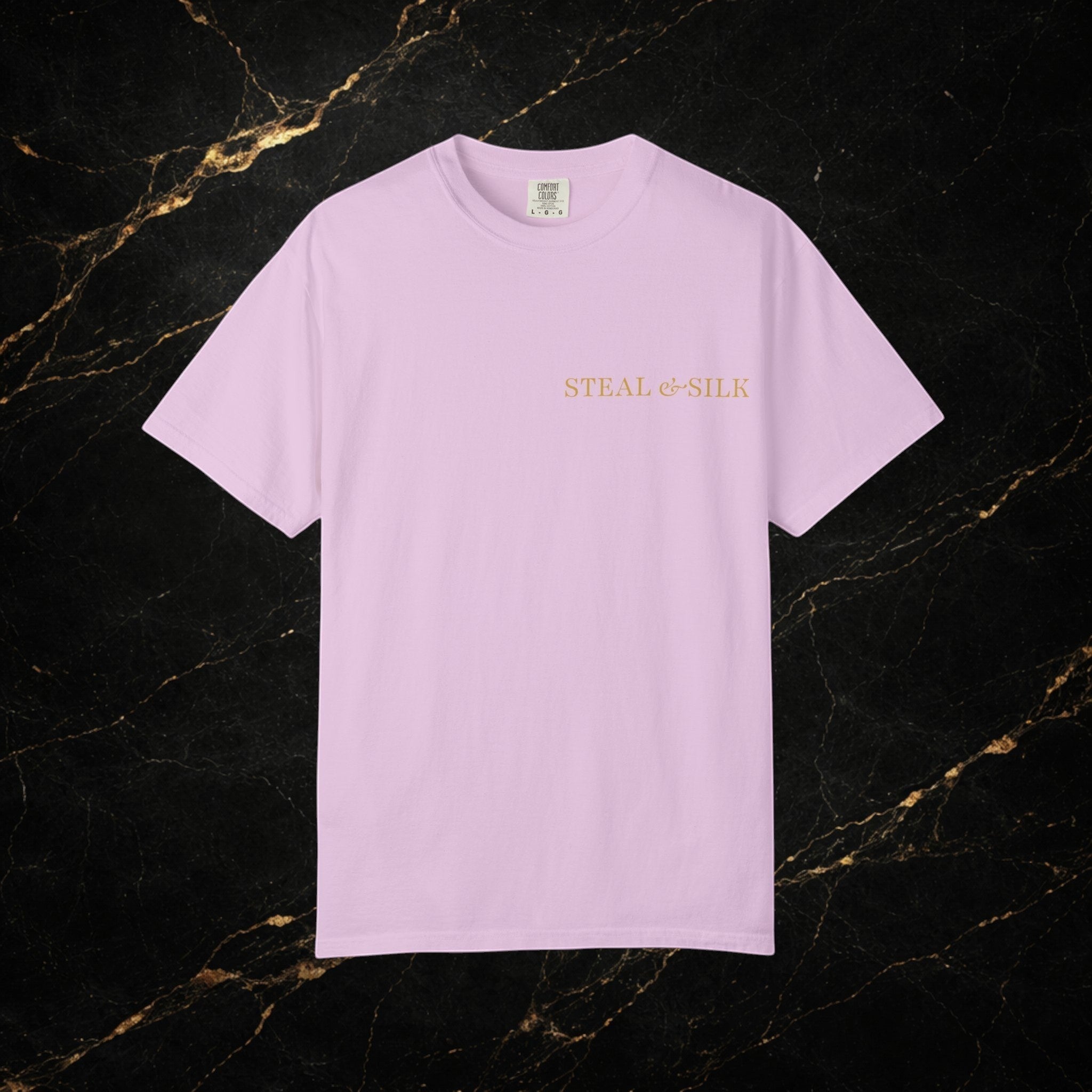 Steal & Silk light pink cotton t-shirt with gold "Handle With Force" heart graphic on front.