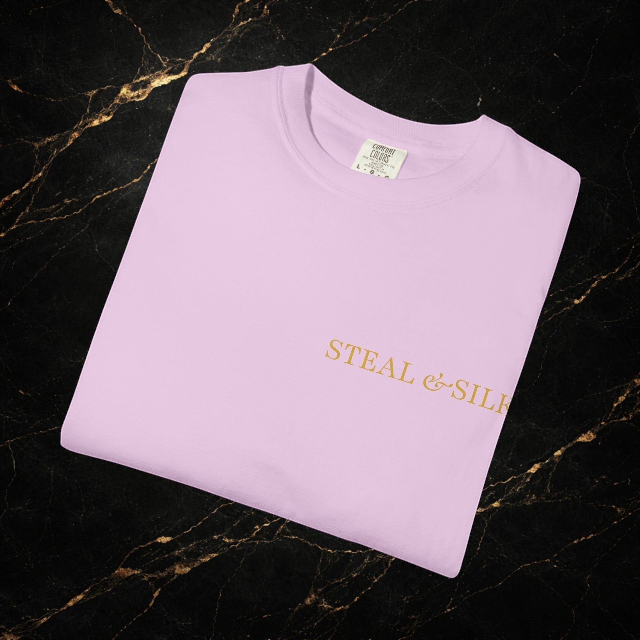 Steal & Silk light pink cotton t-shirt with gold "Handle With Force" heart graphic on front.