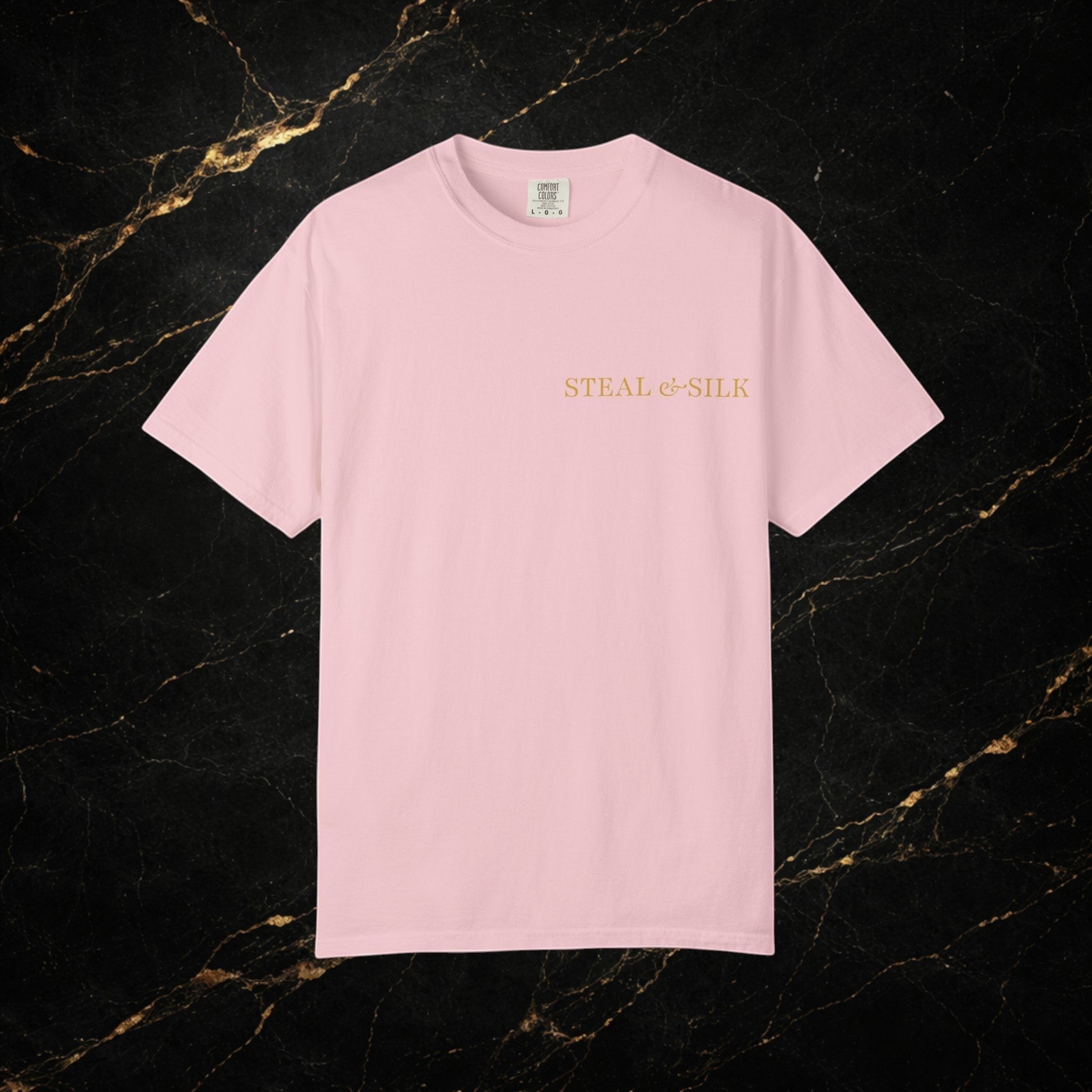 Steal & Silk light pink cotton t-shirt with gold "Handle With Force" heart graphic on chest.