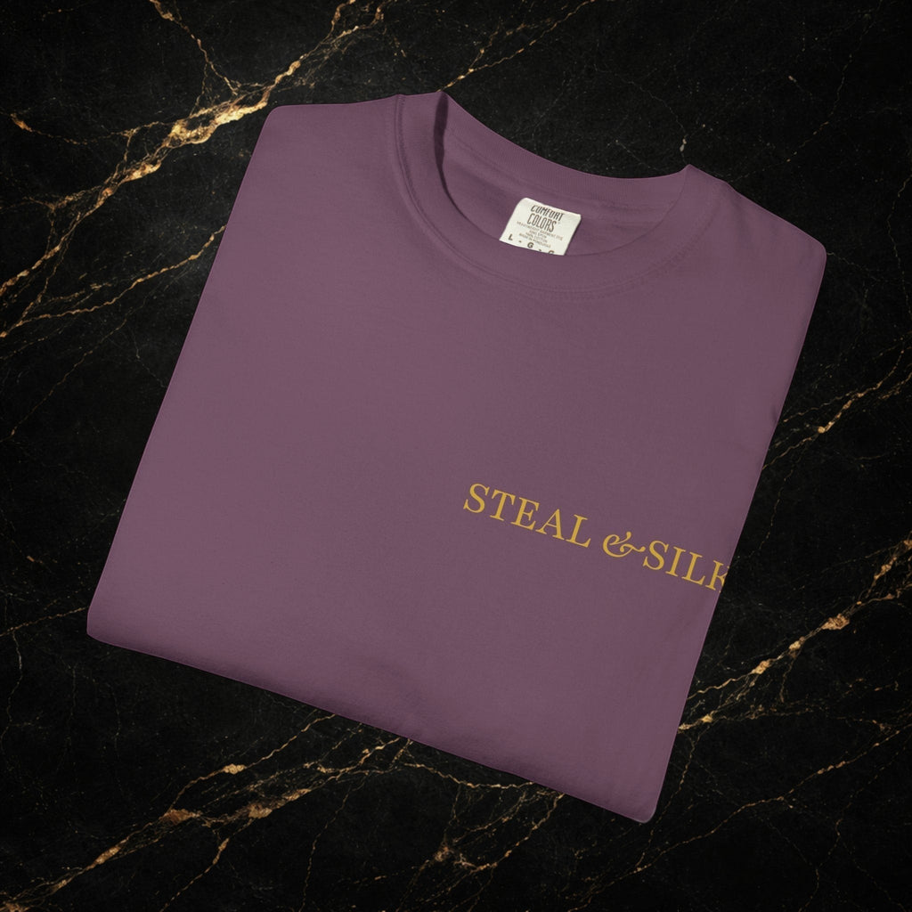 Steal & Silk purple cotton t-shirt with gold "Handle With Force" heart graphic on chest.