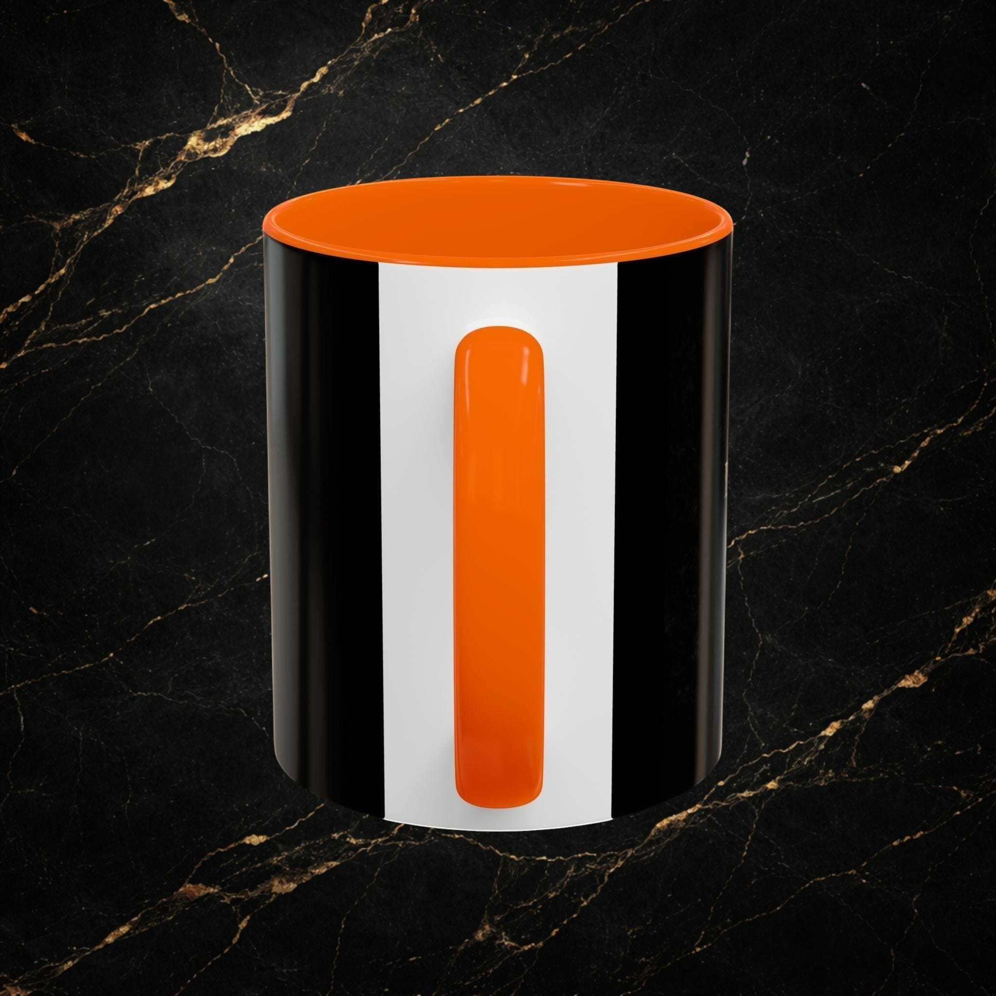 Steel & Silk black and white ceramic mug with orange handle and interior, featuring a bold stripe design.
