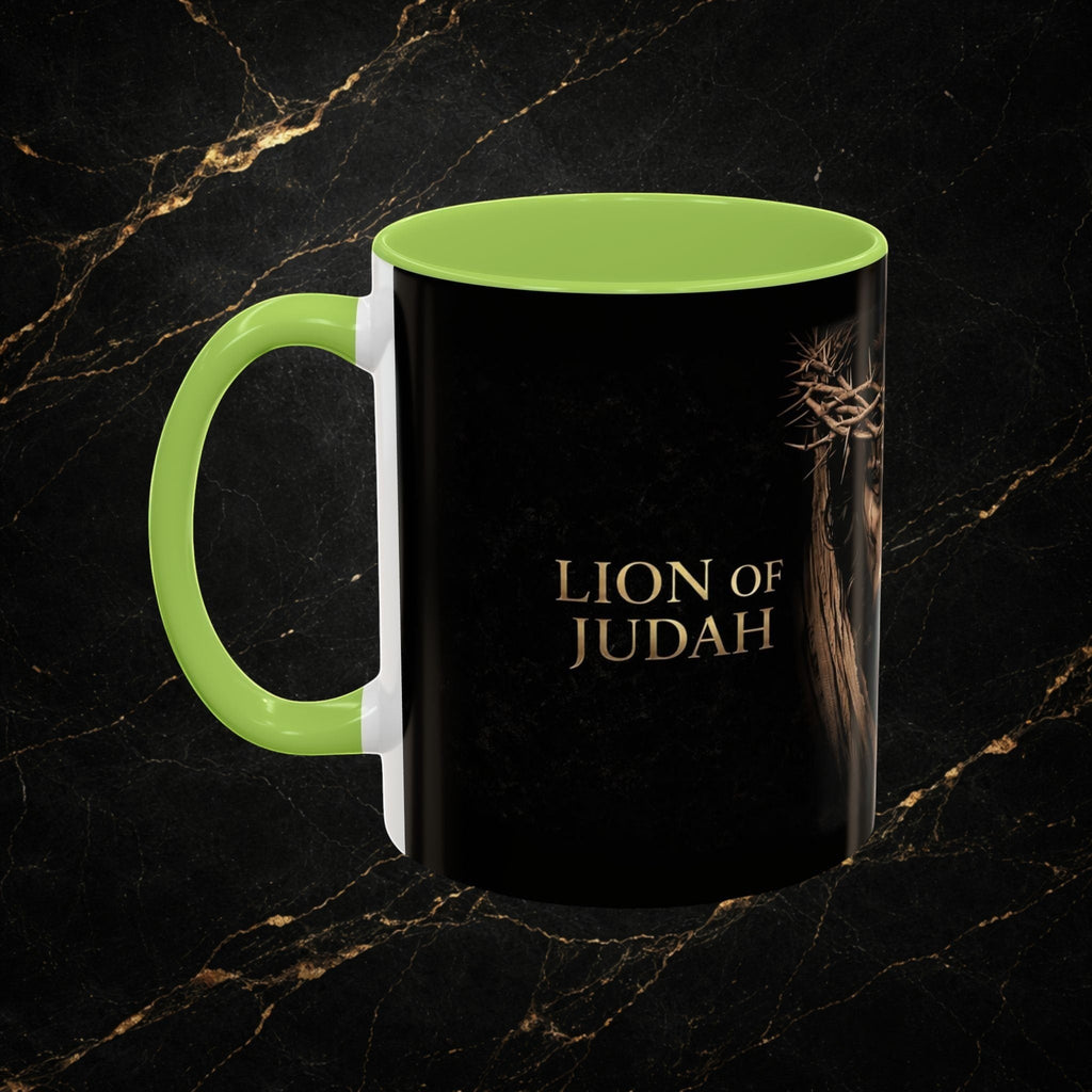 Steel & Silk black ceramic mug with a lime green handle and interior, featuring the "Lion of Judah" text and a crown of thorns graphic.