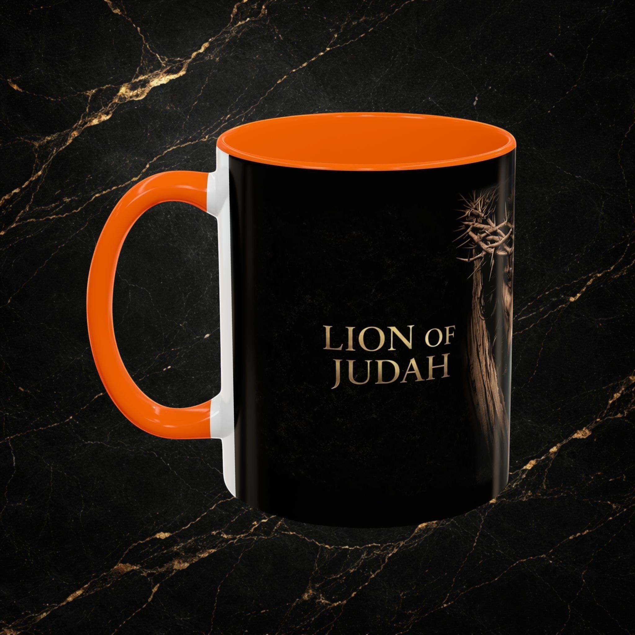 Steel & Silk black ceramic mug with orange handle, featuring the Lion of Judah graphic and text.