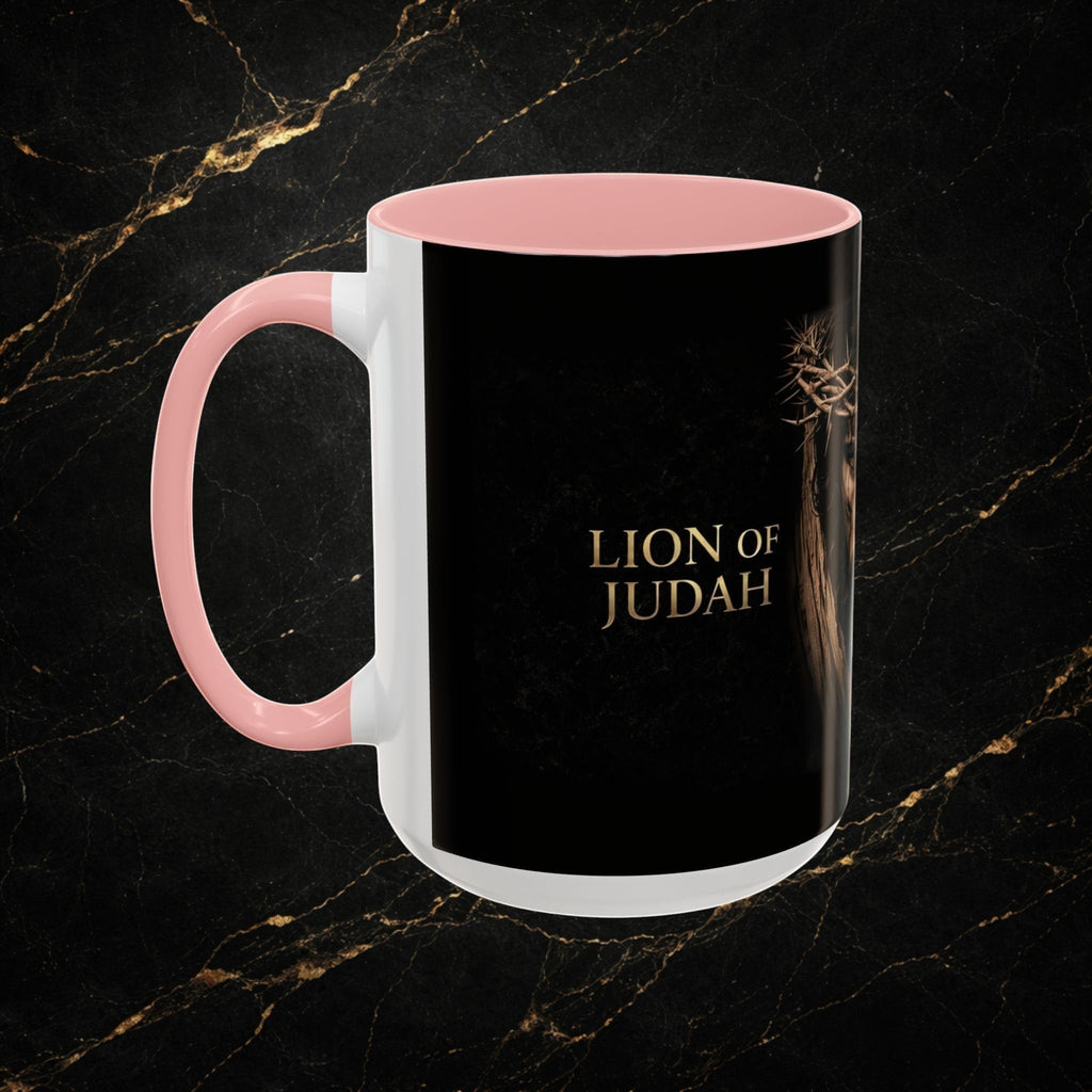 Steel & Silk white ceramic mug with pink handle and interior, featuring a black exterior with gold text "LION OF JUDAH" and an image of Jesus wearing a crown of thorns.