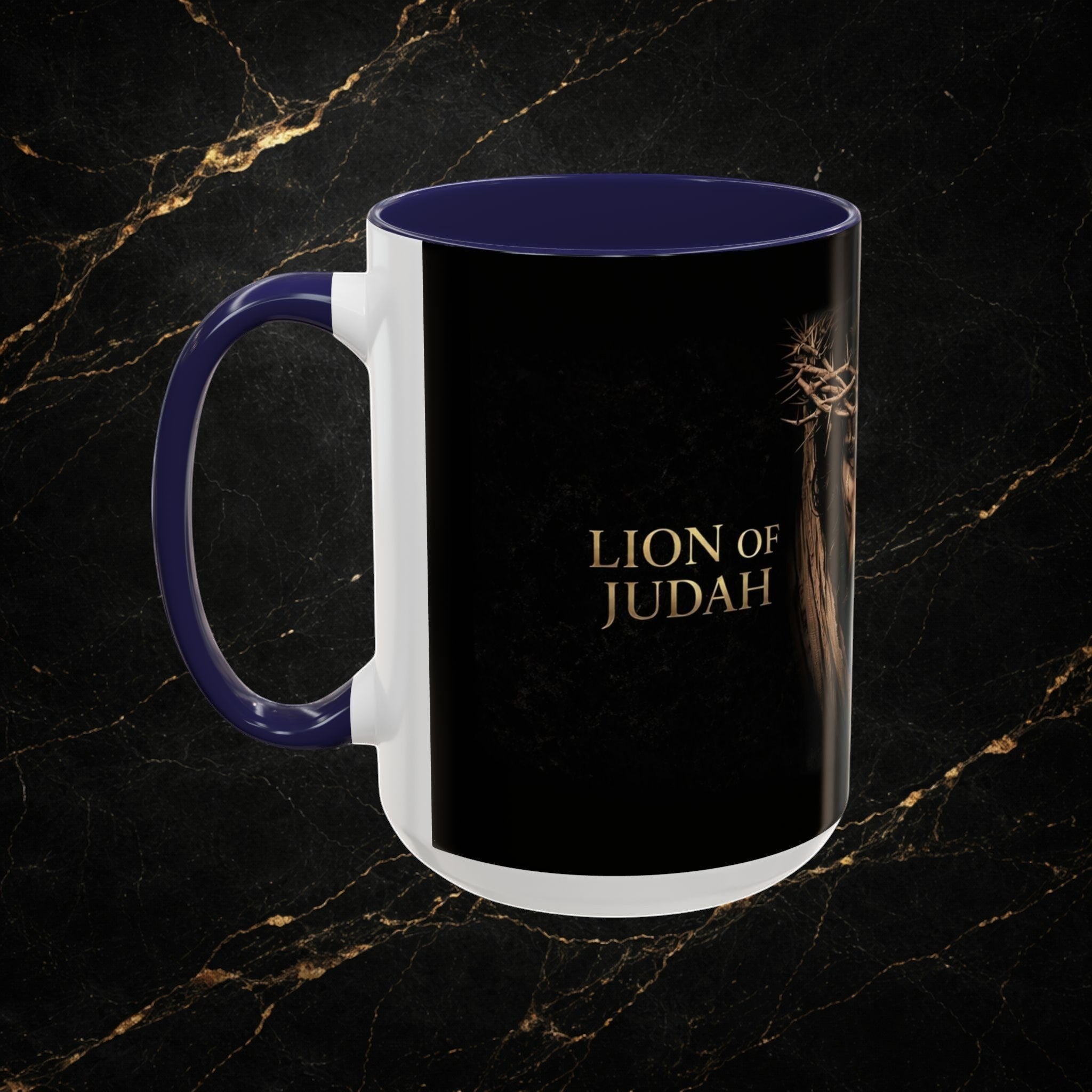 Steel & Silk Lion of Judah Overcomer ceramic mug with navy blue handle and interior, featuring gold text and a crown of thorns.